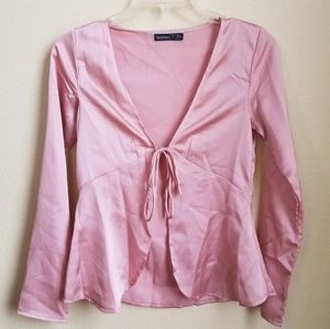 Light pink blouse, ties in the front